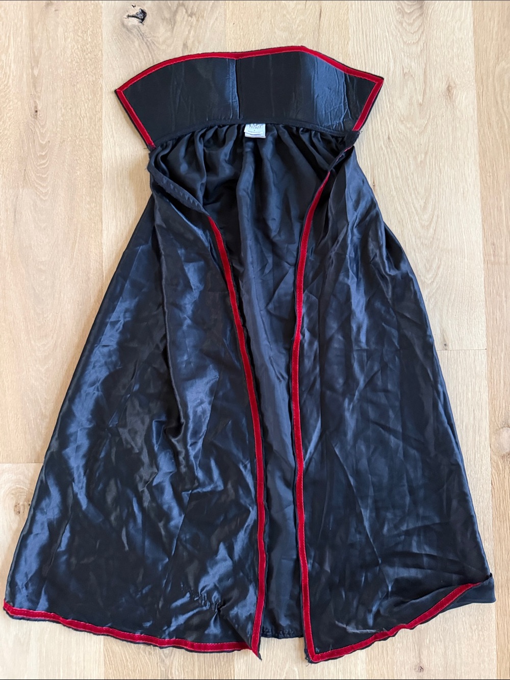 Spirit halloweens Black Satin Strapless vampire cloak with Red Trim